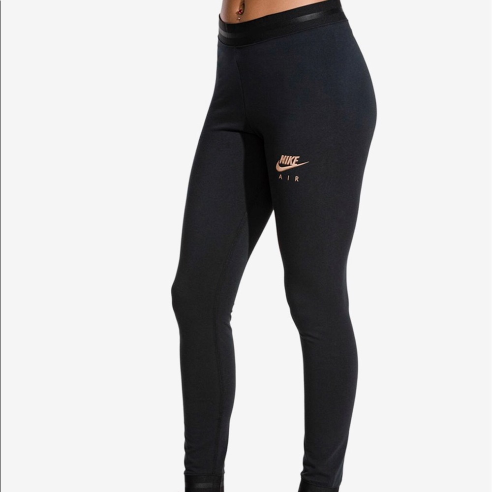SOLD ...Nike Metallic Logo Leggings